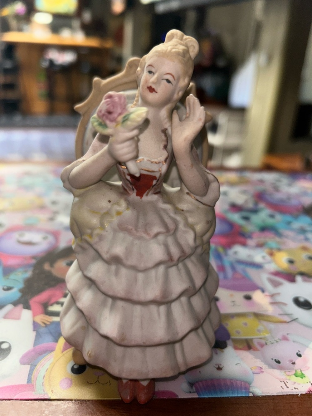 Vintage-Style Pink Ceramic Figurine Lady with Flower
